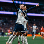 James Maddison celebrates goal with teammate, Heung-Min Son, for Tottenham Hotspur in the Premier League 2024/25 match against Manchester United at Tottenham Hotspur Stadium on Sunday 16 February, 2025