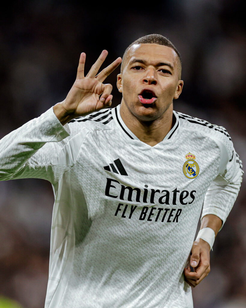 Kylian Mbappe celebrates hat-trick for Real Madrid in the Uefa Champions League 2024/25 Knockout Play-off second leg against Manchester City on Wednesday 19 February, 2025 at Santiago Bernabeu, Madrid