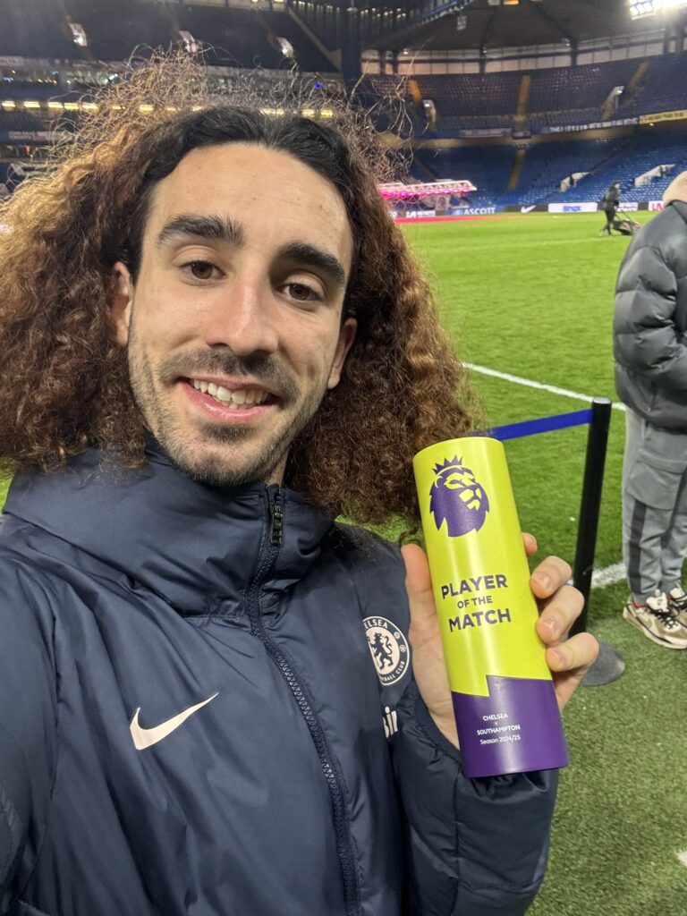 Chelsea left-back, Marc Cucurella, takes a shot with his Player Of The Match award following his amazing performance in the Premier League match against Southampton at Stamford Bridge on Tuesday 25 February, 2025