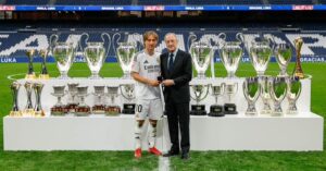 Real Madrid: Perez and Modric pose with the LosBlancos Captain's 28 titles