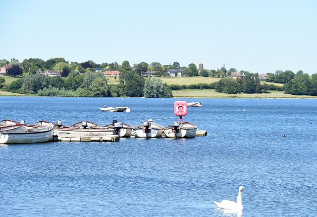 Boat capsized on reservoir, son found, dad missing
