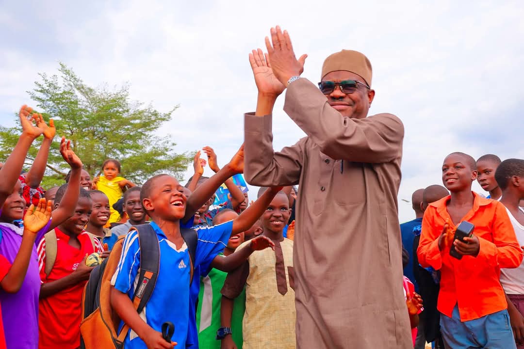 Abuja: Photos - Wike happy as Primary School pupils greet him as he inspects Bridge project