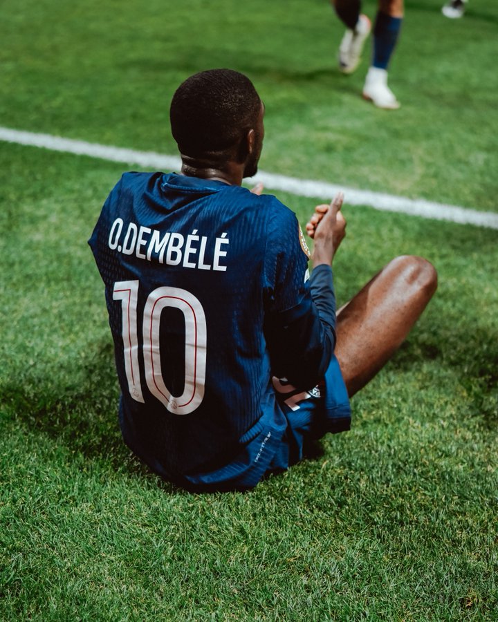 Ousmane Dembele celebrates goal for PSG against Bayern Munich.