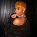 Ayra Starr performs on stage alongside Coldplay with Messi in attendance