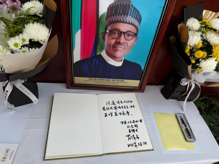 Chinese Deputy MFA signs condolence register in ho our of Late former President, Muhammadu Buhari, at the Nigerian Embassy in Beijing, China