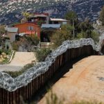 US-Mexico border wall to be painted black to stop climbers