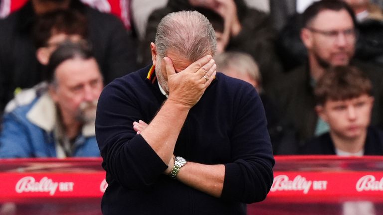 A dejected Ange Postecoglou as Chelsea cruises to a 3-0 triumph over Nottingham Forest in the Premier League match at City Ground