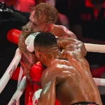 Joshua destroys Paul in sixth round in fight in Miami