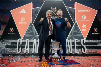 Barcelona beat Real Madrid 3-2 in El Clasico to retain Spanish Super Cup 2 From Left: President of Barcelona, Joan Laporta, Manager Hansi Flick, pose with the Super Cup in Jeddah, Saudi Arabia