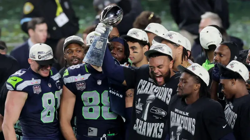 Seattle Seahawks footballers celebrate after defeating New England Patriots in the Super Bowl LX (2026) in Santa Clara, California, Western United States (US)