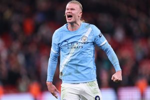 Manchester City keep title hopes alive with 2-1 comeback win over Liverpool at Anfield