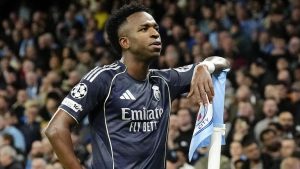 Manchester City 1-2 Real Madrid: Ten-man City eliminated from Champions League as Vinicius net brace