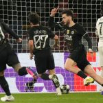 Khvicha Kvaratskhelia celebrates after netting the fifth goal for Paris Saint-Germaine in the Uefa Champions League 2025/26 round of 16 first leg match in Paris on Wednesday 11 March, 2026