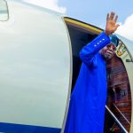 President Bola Ahmed Tinubu waves as he jets out of the country
