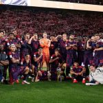 Coach Vincent Kompany alongside his Bayern Munich players and coaching crew take a shot with the DFL Super Cup trophy after a 2-1 triumph over Borussia Dortmund on Saturday 22 August, 2026 at Signal Iduna Park