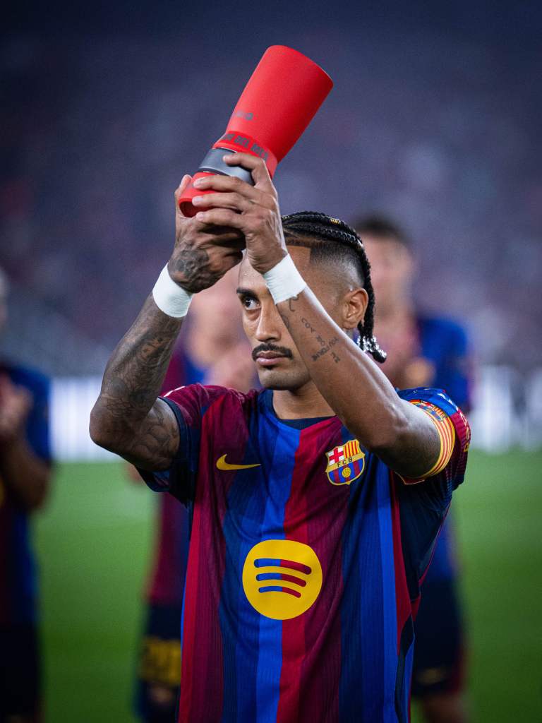 Barcelona 7-2 Racing Santander: Raphinha net hat-trick, win August MVP, Catalans continue perfect start 6 Barcelona forward, Raphinha, takes a shot with his Most Valuable Player (MVP) prize for the month of August at Camp Nou