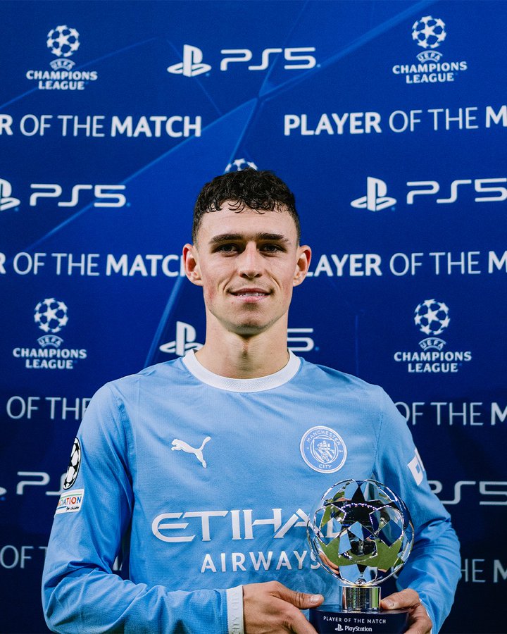 Manchester City 5-1 AEK Athens: Foden net hat-trick, Cityzens clinch second Champions League win 2 Manchester City attacking midfielder, Phil Foden, takes a shot with his Player Of The Match award after his performance against AEK Athens in the UCL game on Tuesday 10 October, 2026 at Etihad Stadium