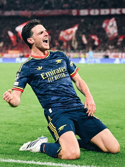 Declan Rice celebrates after levelling for Arsenal in the League Phase match of the Uefa Champions League 2026/27 against Bayern Munich at Allianz Arena on Wednesday 21 October, 2026
