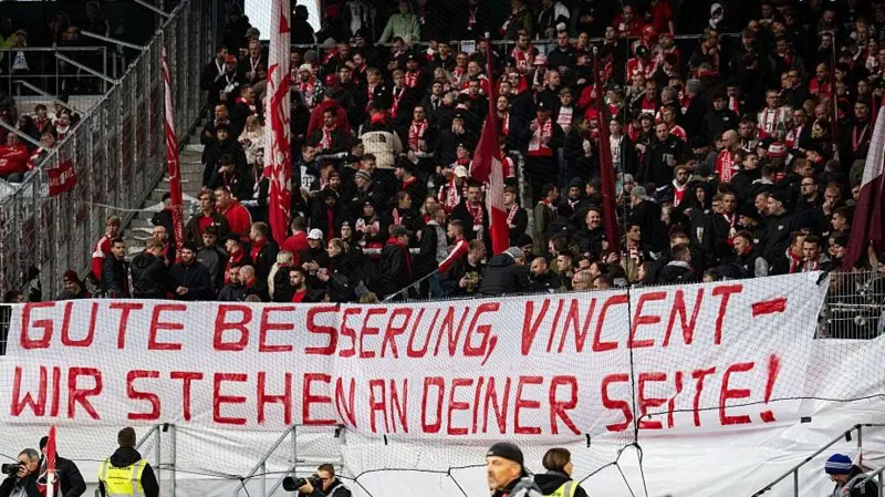 Bayern Munich fans hold a banner high during the Bundesliga match against Freiburg at Europa-Park Stadion on Sunday 25 October, 2026 that translates as 'Get well soon, Vincent - we are by your side' 