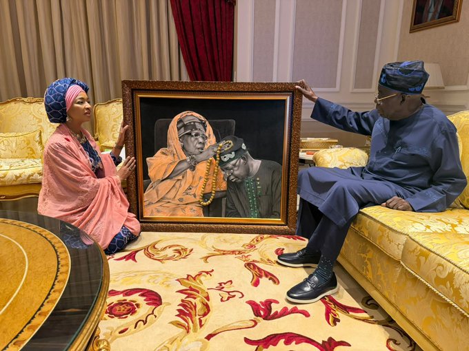 Photos: Minister Musawa present drawing to President Tinubu made of him and his late mother 10 Hannatu Musa Musawa, presents drawing to President Bola Ahmed Tinubu made of him and his late Mother, Alhaja Mogaji